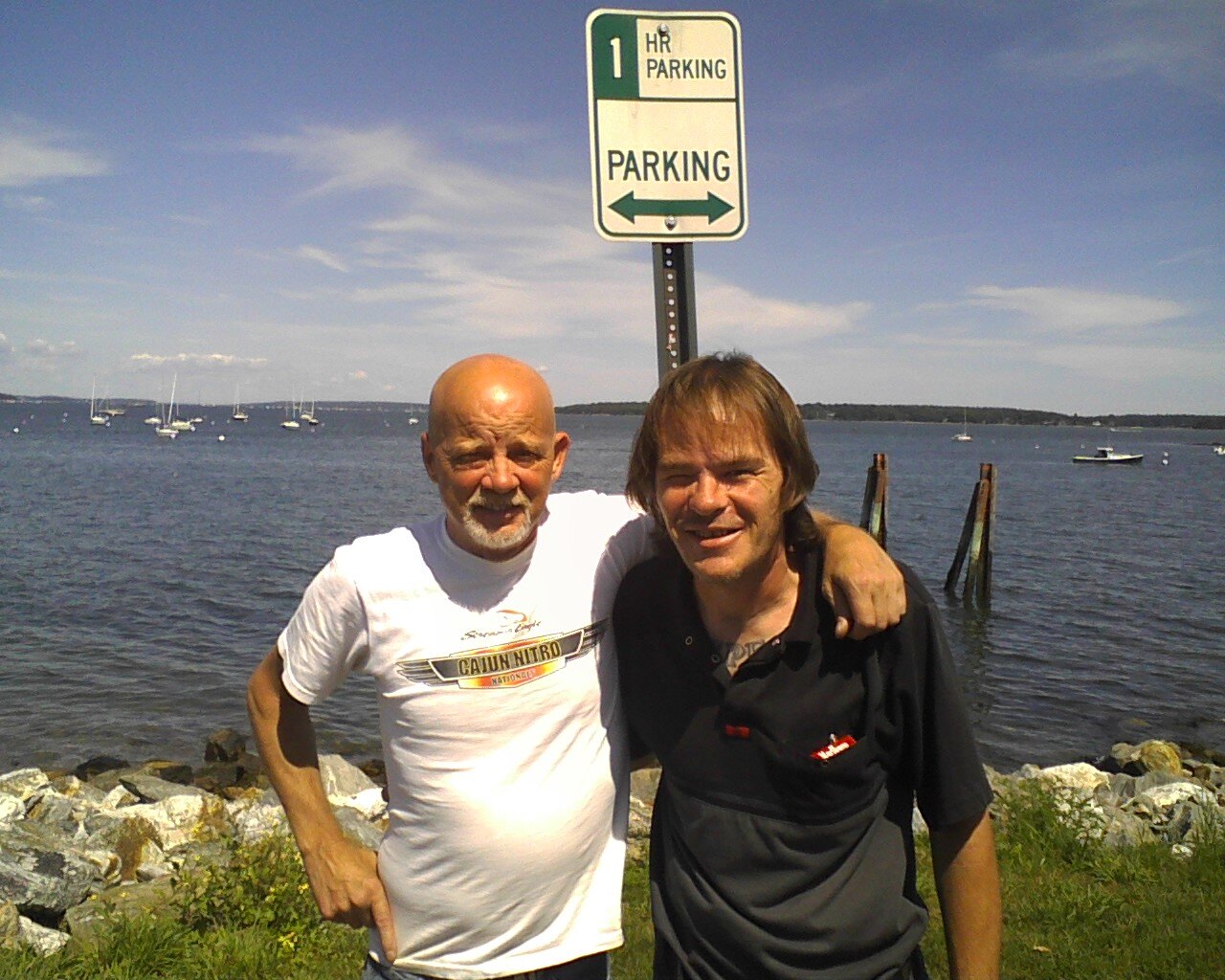 David and Rick together by the water