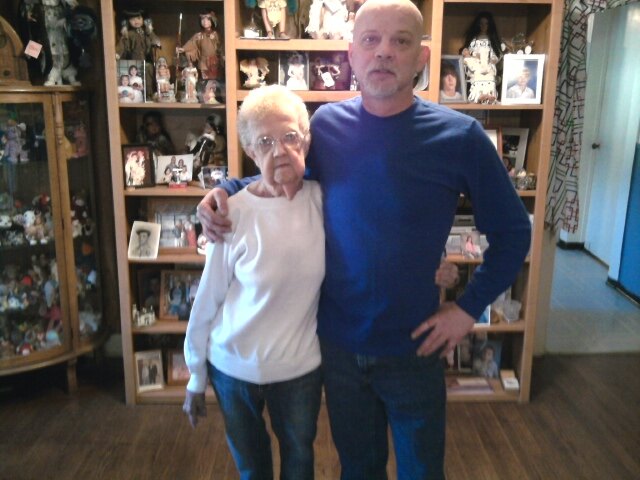 David standing with his mother